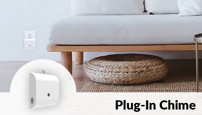 A white Plug-in chime plugged into a wall outlet beside a white and light wood couch. Plus, a close up of the device itself.